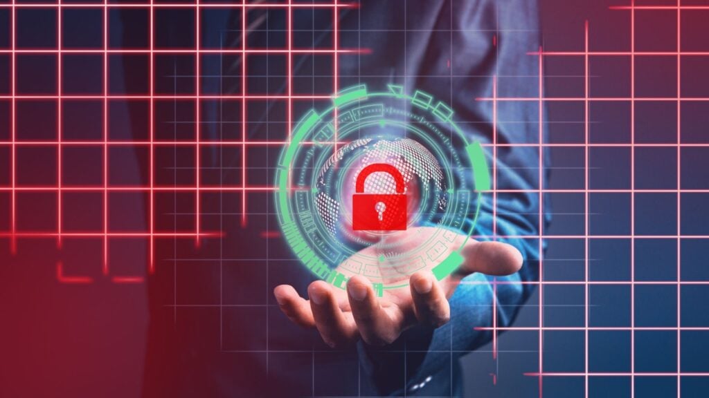 featured image of man with security orb graphic hovering in palm for SharePoint Zero-Day Fix for CVE-2025-53770 & 53771 blog