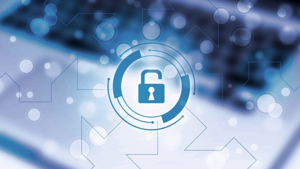 Cybersecurity awareness month blog featured image of a computer with digital lock graphic