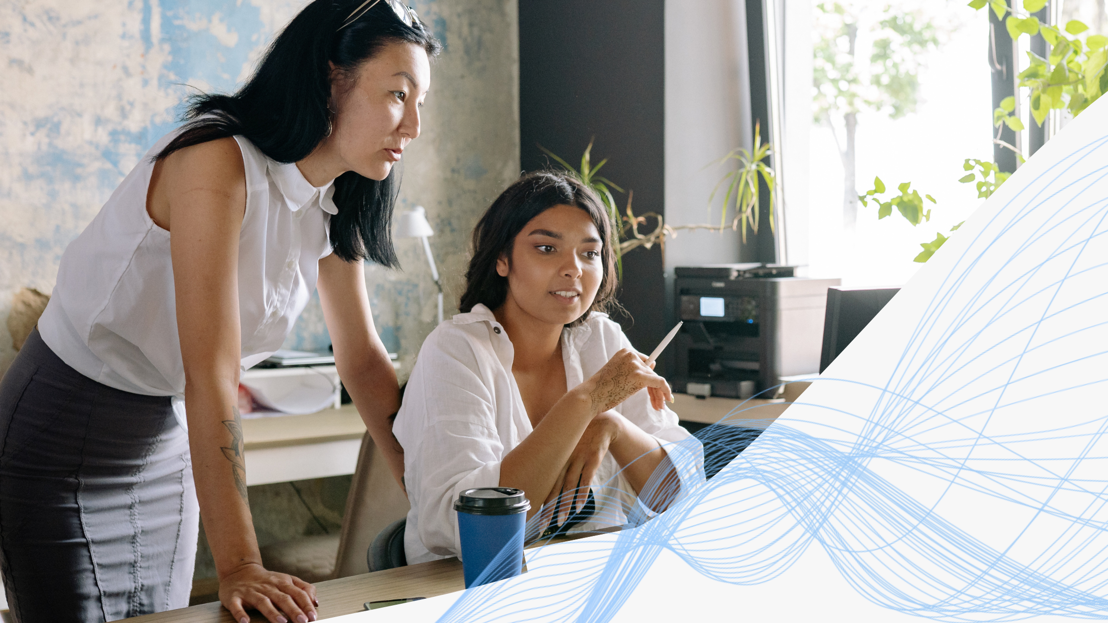 Microsoft 365 Copilot for Business featured image of smb workers being productivity to reflect the benefits of copilot business for SMBs